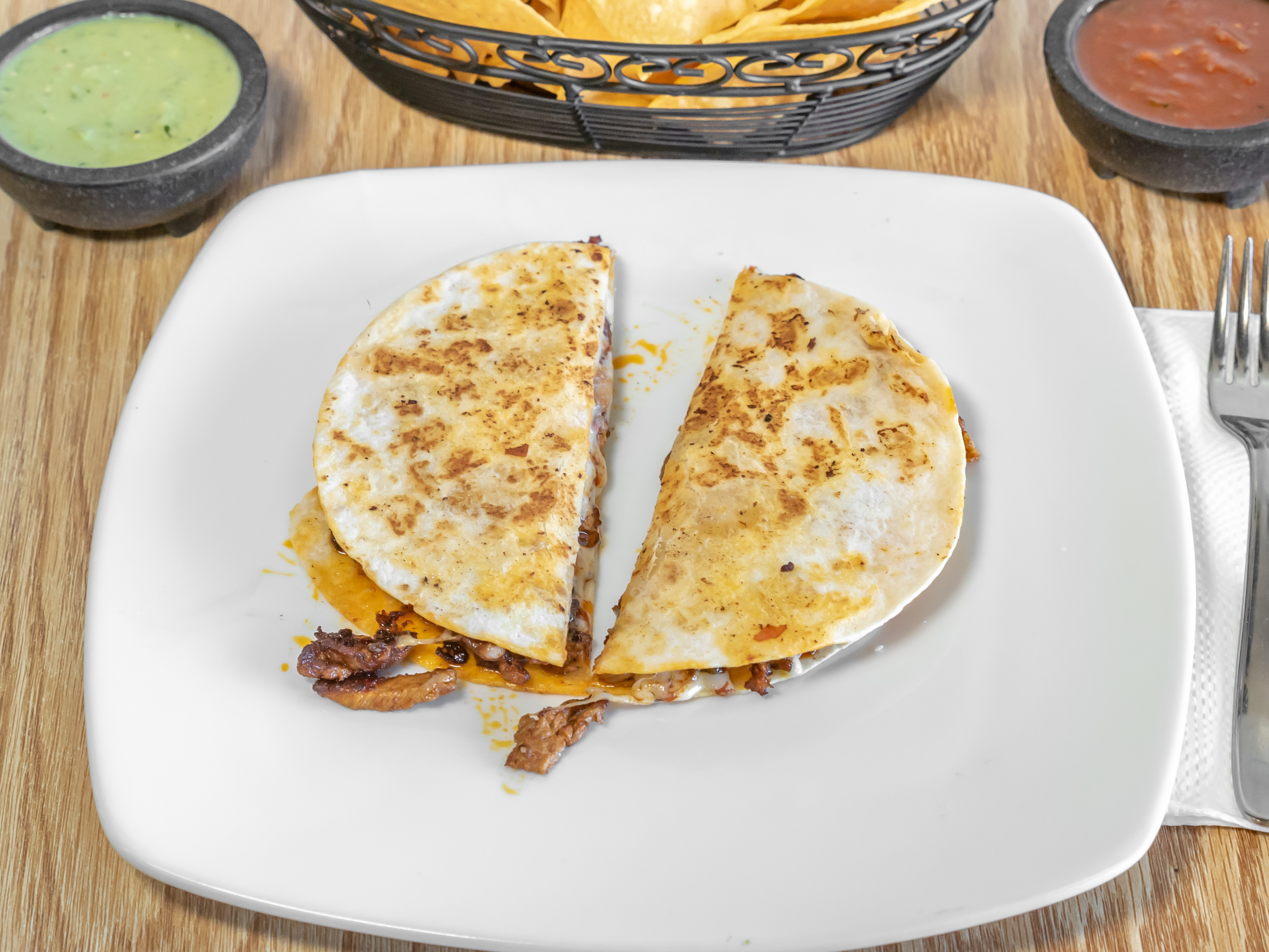 Quesadilla Suiza with melted cheese